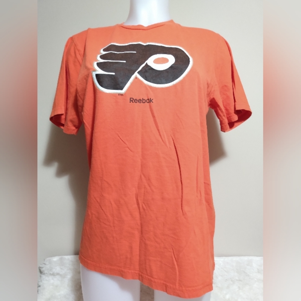 Reebok Woman's medium flyers hockey shirt